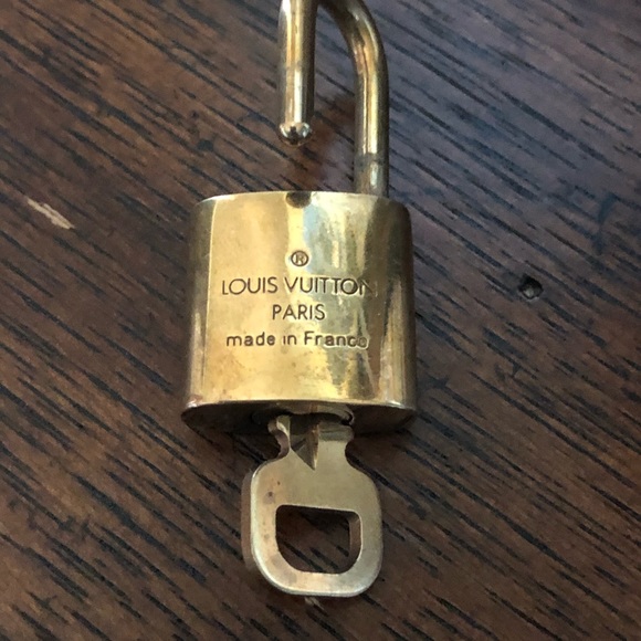Louis Vuitton Handbags - Authentic Louis Vuitton lock and key